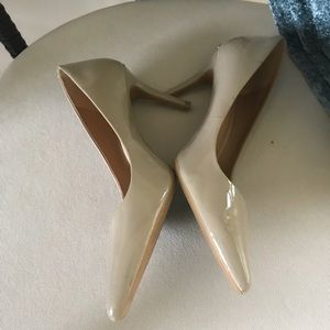 Nude pumps.
